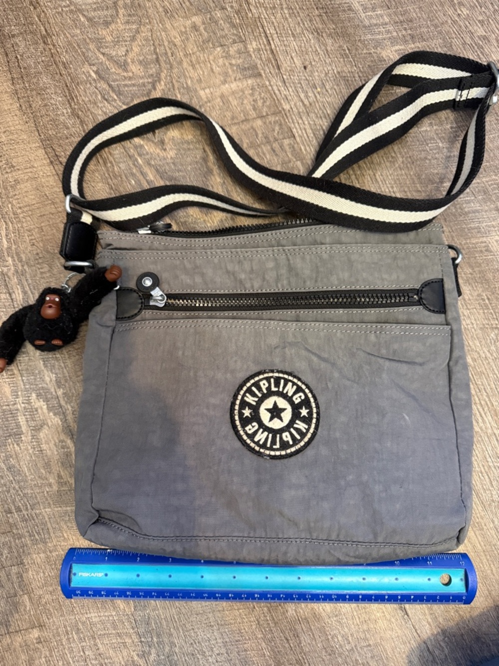 Kipling Gray Crossbody Messenger with Striped Strap